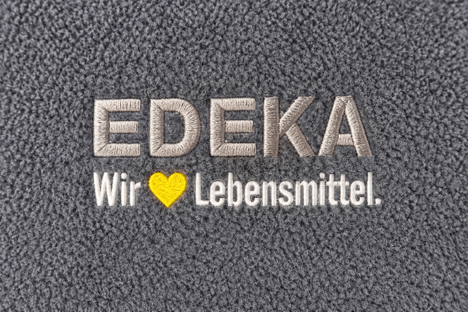 Damen- und Unisex-Fleecejacke, grau meliert – Arbeitskleidung für EDEKA-Märkte von Schweissthal