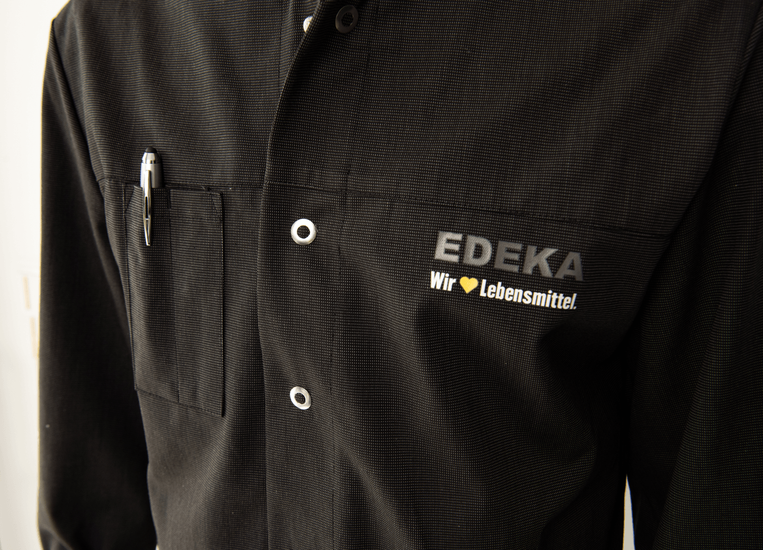Servicejacke, schwarz meliert – Arbeitskleidung für EDEKA-Märkte von Schweissthal